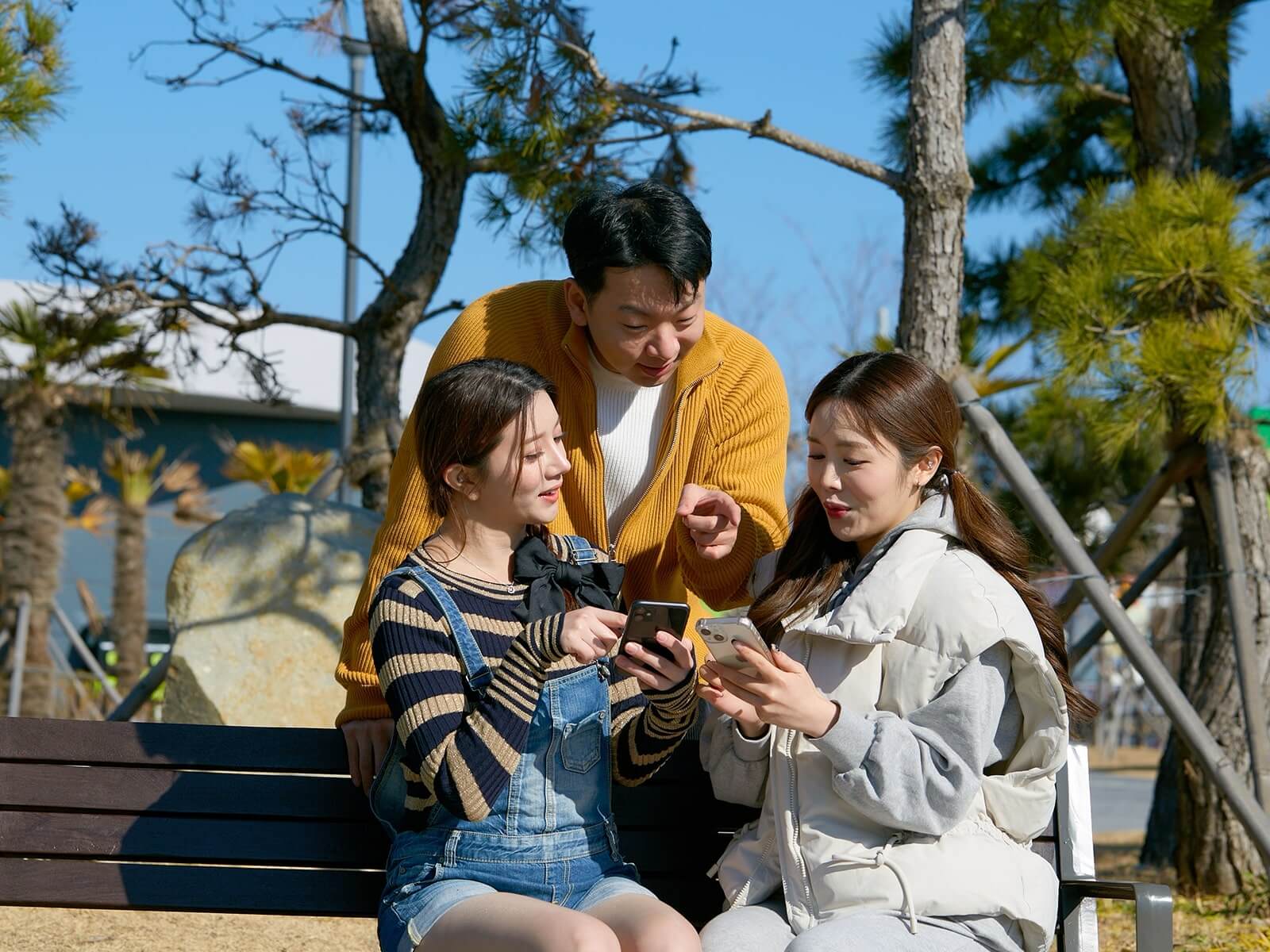 Three friends share photos of their experience at Skyline Luge Busan.